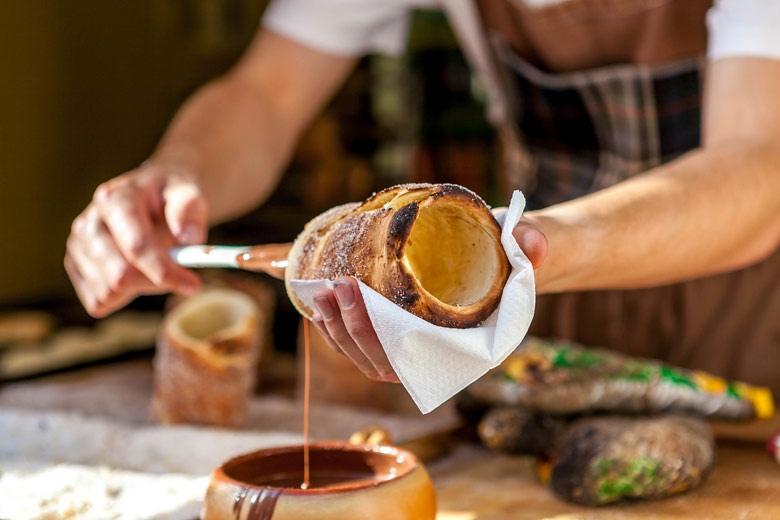 Chocolate-coated chimney cake or trdelník